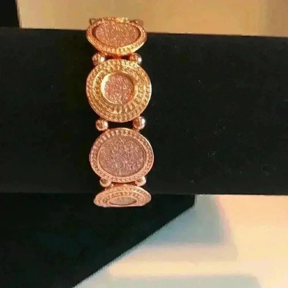 Macy’s new copper colored faux diamond bracelet - Picture 3 of 8